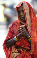 Woman in prayer, Varanasi, India
